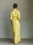 Yellow linen maxi dress for women by FJØRNA, flowing design with thin shoulder straps and a relaxed fit.