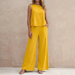 FJØRNA sunlit yellow sleeveless two-piece set with flowing wide-leg pants, perfect for casual summer wear.