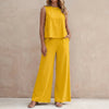 FJØRNA sunlit yellow sleeveless two-piece set with flowing wide-leg pants, perfect for casual summer wear.