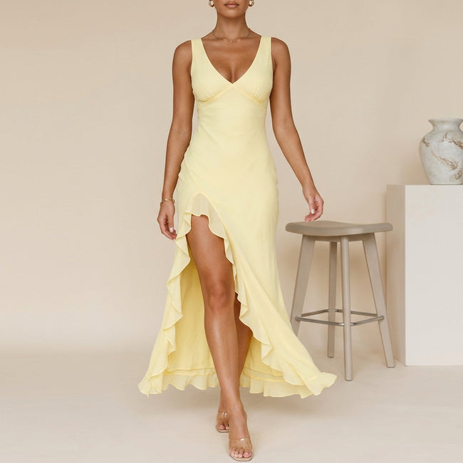 Yellow FJØRNA elegant maxi dress for women with a V-neck and sleeveless design, perfect for sophisticated summer wear.