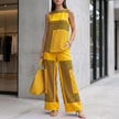 FJØRNA yellow sleeveless top with asymmetrical hem paired with wide-leg pants, stylish 2-piece set, casual and chic summer outfit