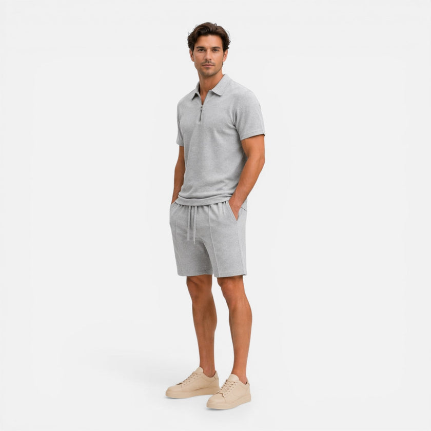 Men's textured zip polo shirt and shorts set in summer style, by FJØRNA, featuring a zip neck and casual fit.