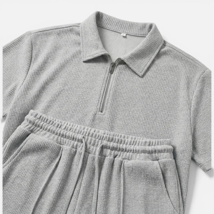 Men's textured zip polo shirt and shorts set by FJØRNA, perfect for summer, featuring a stylish zip neckline and comfortable fit.