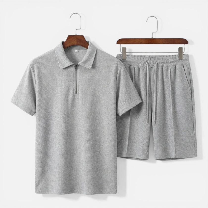 Men's textured zip polo shirt and shorts set by FJØRNA, casual summer co-ord with a modern design and comfortable fit.