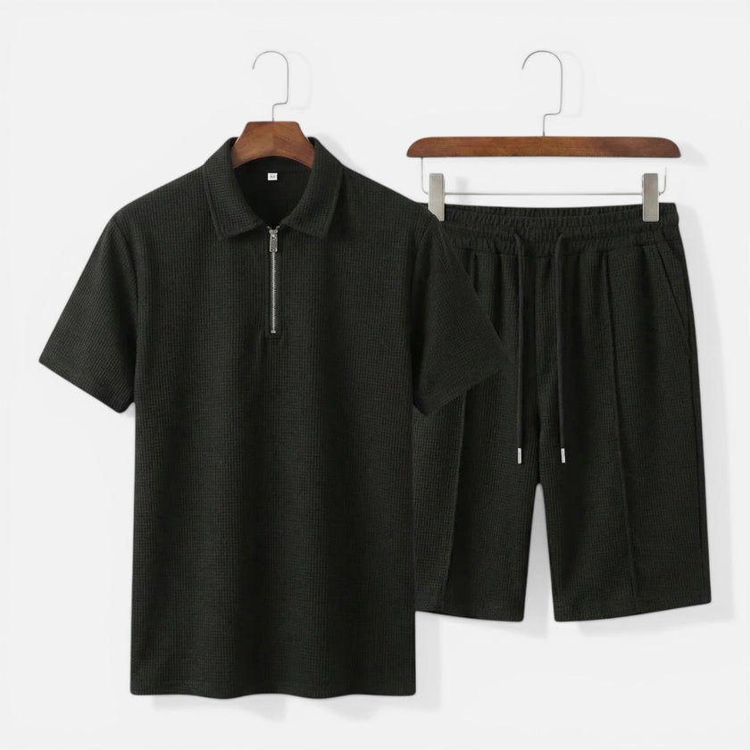 Men's textured zip polo and shorts set by FJØRNA, featuring a stylish summer co-ord with a zip neck design.