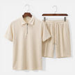 Men's textured zip polo shirt and shorts set in summer style by FJØRNA, casual men's clothing with a zip neck design.
