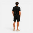 Men's textured zip polo shirt and shorts set in summer colors, stylish men's set by FJØRNA with a modern design.