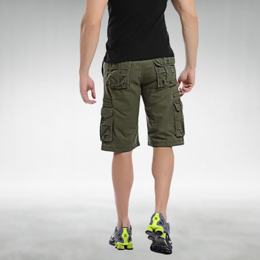 FJØRNA men's cargo shorts with belt and multiple pockets, displayed on a model for casual outdoor wear.