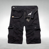 Men's cargo shorts by FJØRNA with belt and multiple pockets, suitable for casual wear and outdoor activities.