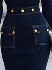 Navy ribbed knit dress by FJØRNA featuring gold-tone buttons and denim pocket details, perfect for casual women’s fashion.