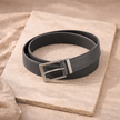 FJØRNA vegan adjustable unisex ring belt made of eco-friendly material, featuring a sleek design with a metal buckle.