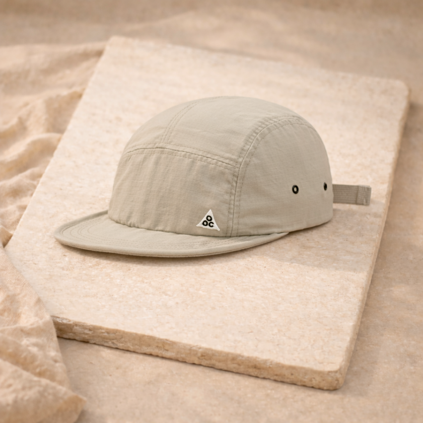 Men's FJØRNA cap hat with a curved brim, adjustable strap, and stylish design, perfect for casual outdoor wear.