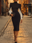 White FJØRNA midi dress for women featuring a flowy design and elegant silhouette, perfect for casual or semi-formal occasions.