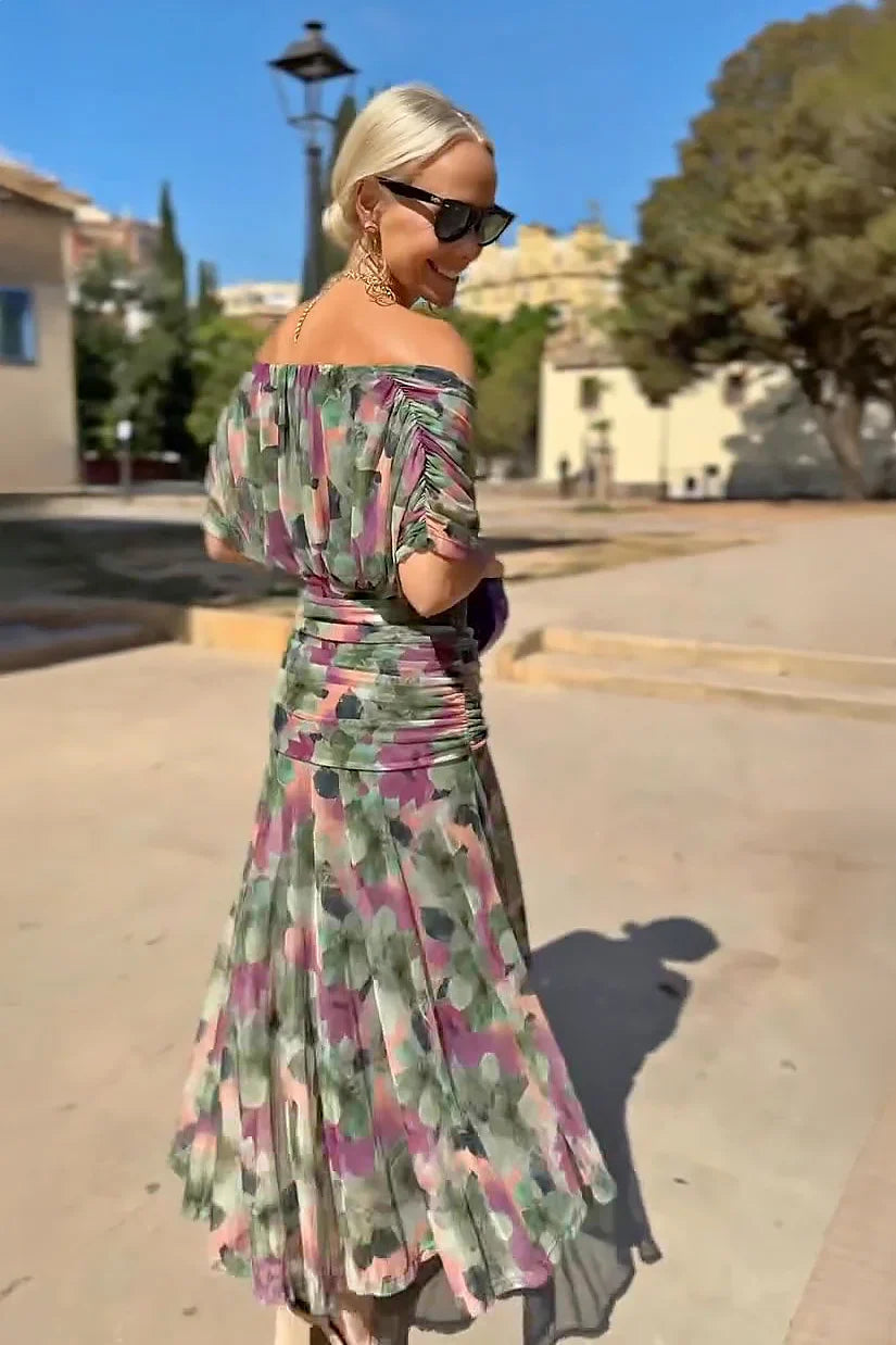 FJØRNA white maxi dress with elegant V-neck, fantasy floral print, perfect for parties, flowing and stylish women's dress