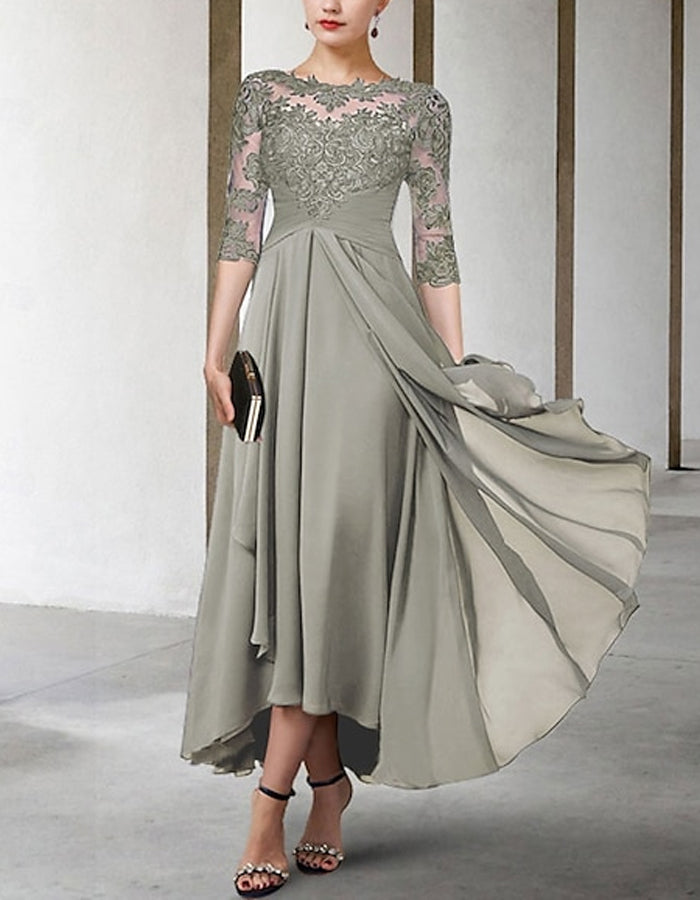 FJØRNA chiffon midi dress for women with A-line silhouette and three-quarter sleeves, flowing and elegant.