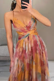 Elegant FJØRNA women's flowing evening dress displayed on a model, showcasing its stylish design and graceful fit.