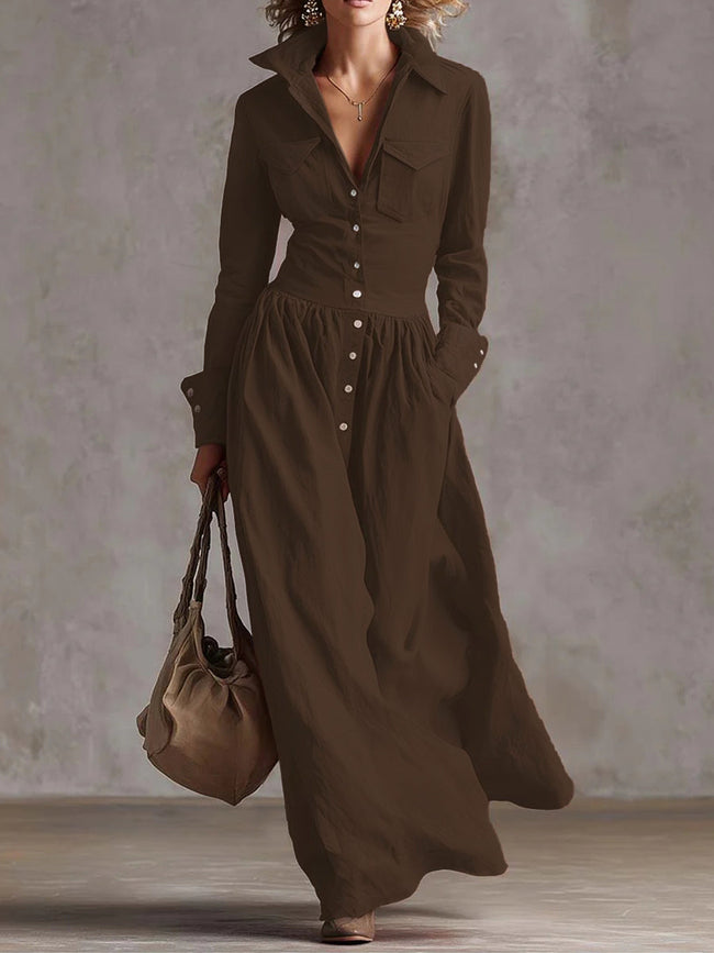 FJØRNA high waisted long sleeve maxi dress with pleated pockets, split-joint lapel, and solid color, shown on a model.