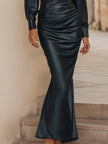 FJØRNA elegant satin long sleeve maxi dress with draped design, flowing fabric, and sophisticated style.