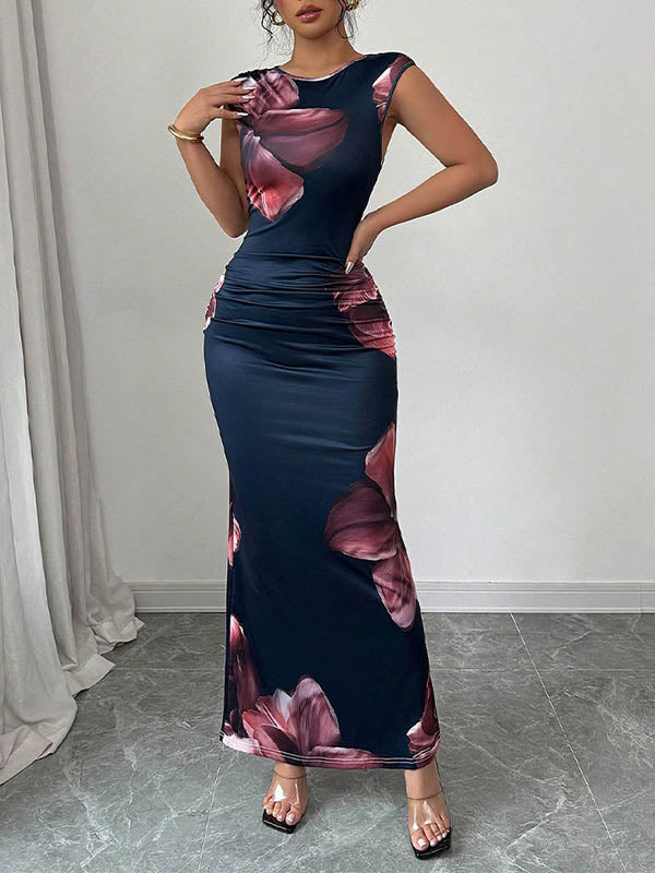 FJØRNA white sleeveless bodycon maxi dress with contrast color flower print and round neckline, stylish and elegant for summer wear.