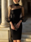 FJØRNA sheer-sleeve high-neck cocktail dress for women, elegant black dress with sheer long sleeves and a fitted silhouette.