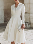 FJØRNA zip-front long sleeve fit-and-flare midi dress for women, featuring a stylish silhouette and elegant design.