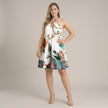 FJØRNA white halter neck printed mini dress with flowy A-line fit and floral pattern, perfect for casual or summer wear.