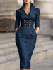 FJØRNA double-breasted structured denim midi dress in blue with a fitted waist and classic collar, styled for a chic look.