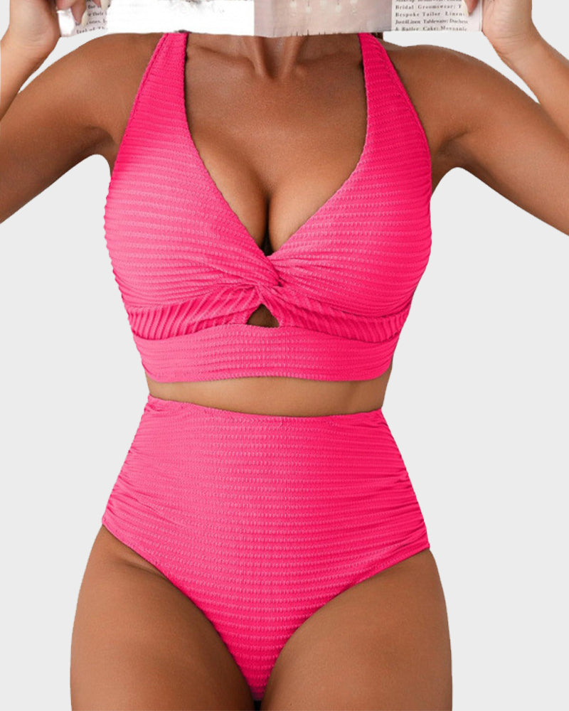 FJØRNA women's bikini set featuring a flattering fit, with a colorful patterned top and matching bikini bottoms on a model.