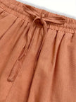FJØRNA women's lightweight summer trousers with relaxed fit, drawstring waist, and side pockets, perfect for casual wear.