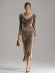 FJØRNA velvet midi dress styled for evening wear, featuring a sleek, elegant design with a fitted silhouette and soft fabric.