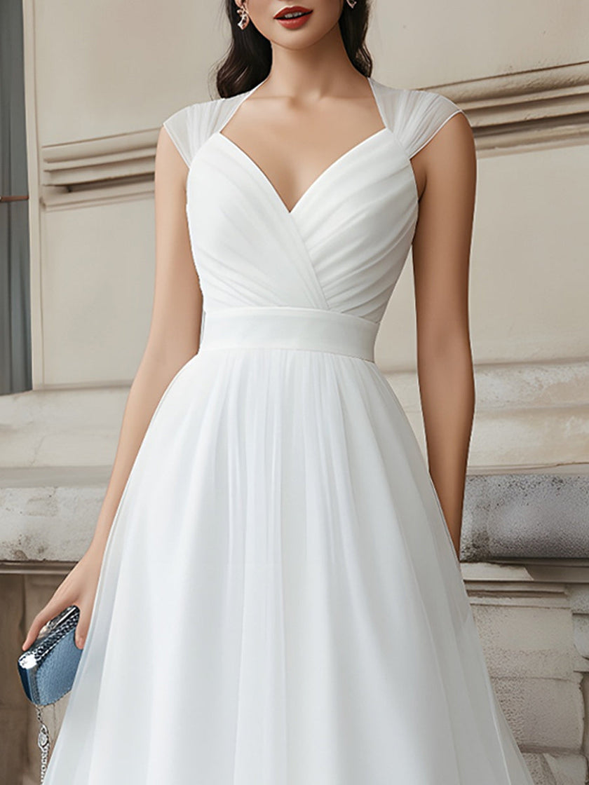 FJØRNA V-neck pleated midi dress with cap sleeves, sleeveless design, flows elegantly with a fitted waist and stylish pleats.