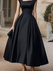 FJØRNA square neck structured midi dress with floral shoulder accents, showcasing a stylish and elegant dress design.
