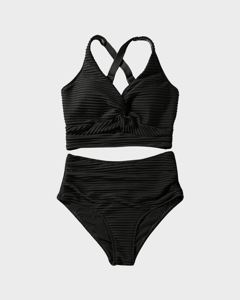 Women's bikini set by FJØRNA featuring a flattering swimwear fit, with a stylish top and matching bottom for summer beachwear.