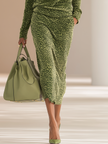 FJØRNA green leopard print velvet top and skirt set featuring a stylish, coordinated outfit with bold animal print and soft velvet fabric.