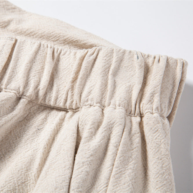 Men's lightweight linen blend trousers from FJØRNA featuring casual summer pants with a relaxed fit and neutral color.