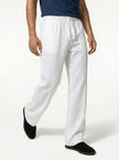 Men's linen trousers by FJØRNA, relaxed fit summer pants, breathable lightweight linen fabric, natural beige color.