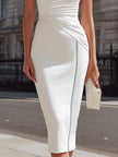 FJØRNA sleeveless ruched side zip midi dress, showcasing a fitted silhouette with ruched details and a sleek side zipper.