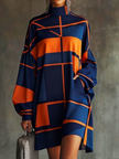 White FJØRNA long sleeve dress with contrast color pleats, split-joint zipper, and pocket details.