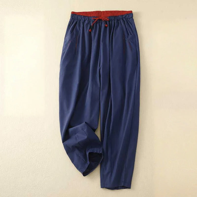 FJØRNA Vivo™ relaxed summer pants in lightweight fabric, shown in a casual fit with an elastic waistband and side pockets.