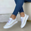 FJØRNA women's orthopedic sneakers with lightweight breathable fabric and arch support, designed for comfort and foot health.