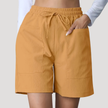 FJØRNA women's lightweight summer shorts with wide legs, drawstring waist, and side pockets, perfect for casual warm-weather wear.