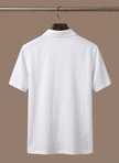 Men's linen beach shirt by FJØRNA, lightweight and breathable summer polo with button-up front, ideal for casual beachwear.
