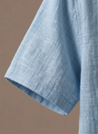 Men's linen beach shirt by FJØRNA, lightweight and breathable summer polo, button-up style perfect for warm weather.