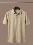 Men's linen beach shirt by FJØRNA, lightweight and breathable summer polo, shown as a button-up shirt with a relaxed fit.