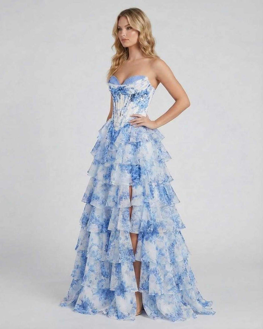 Azure chiffon maxi dress for women by FJØRNA featuring a strapless corset, floral design, layered skirt, and romantic, elegant silhouette.