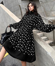 White Dot Veil Dress by FJØRNA, elegant dress with dotted pattern, flowing fabric, and delicate design perfect for special occasions.