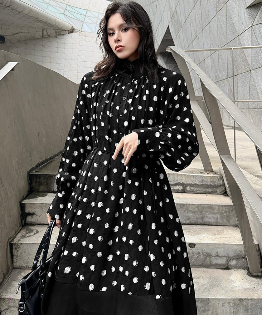 FJØRNA Dot Veil Dress in white, featuring a delicate dotted pattern and flowing fabric, perfect for elegant occasions.