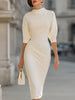 Cream FJØRNA turtleneck puff-sleeve midi dress with short sleeves, showcasing a stylish, elegant midi-length design.