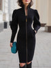 FJØRNA leather zippered midi dress with puffed long sleeves, fitted silhouette, and stylish design.