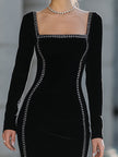 FJØRNA velvet long-sleeve square-neck gown with rhinestone trim, elegant women's dress featuring a fitted silhouette and luxurious fabric.